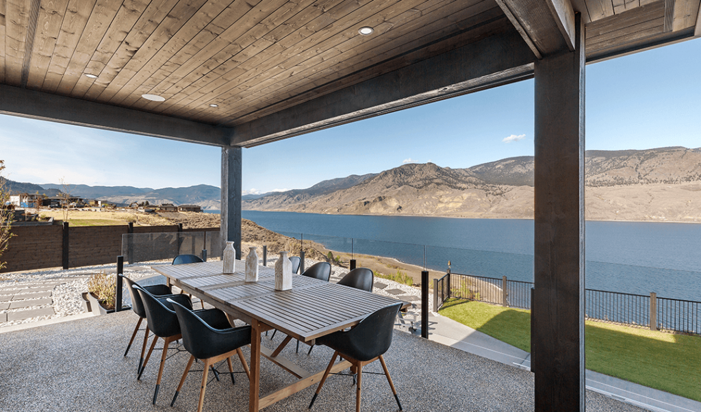 Outdoor Living Spaces - View of the lake from the back porch of a home