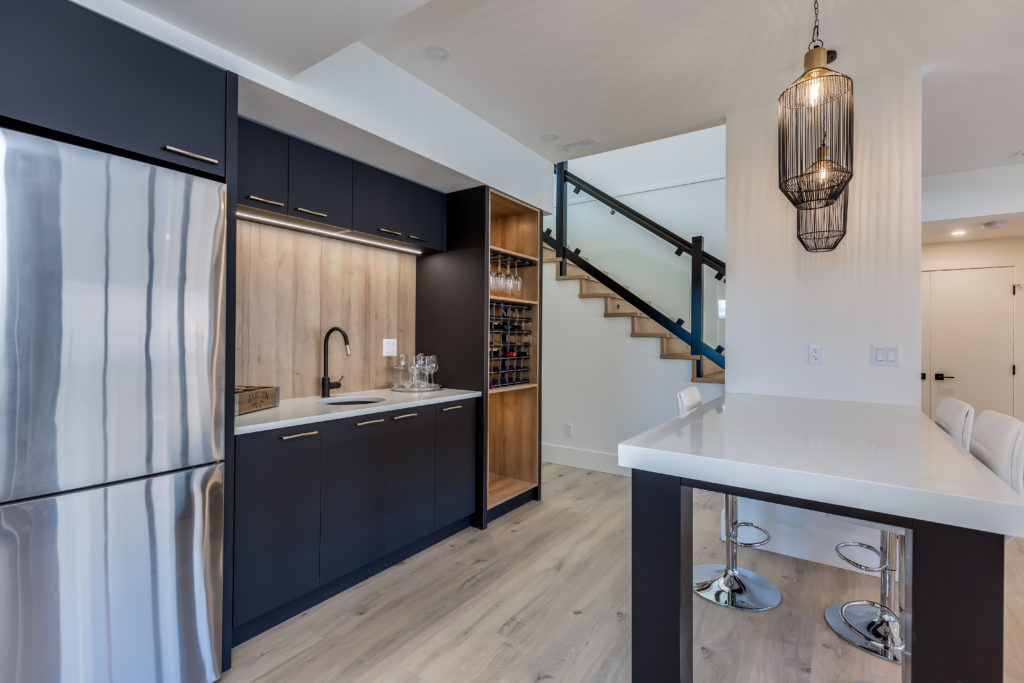 Elegant kitchen with dark cabinets