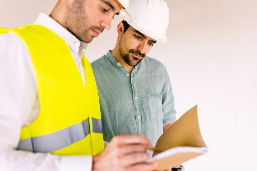 Contractors reviewing costs